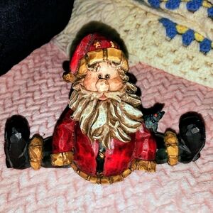 Festive Santa Figurine with Red and Gold Accents